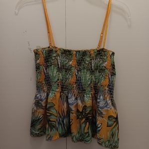 Tank palm leaves top